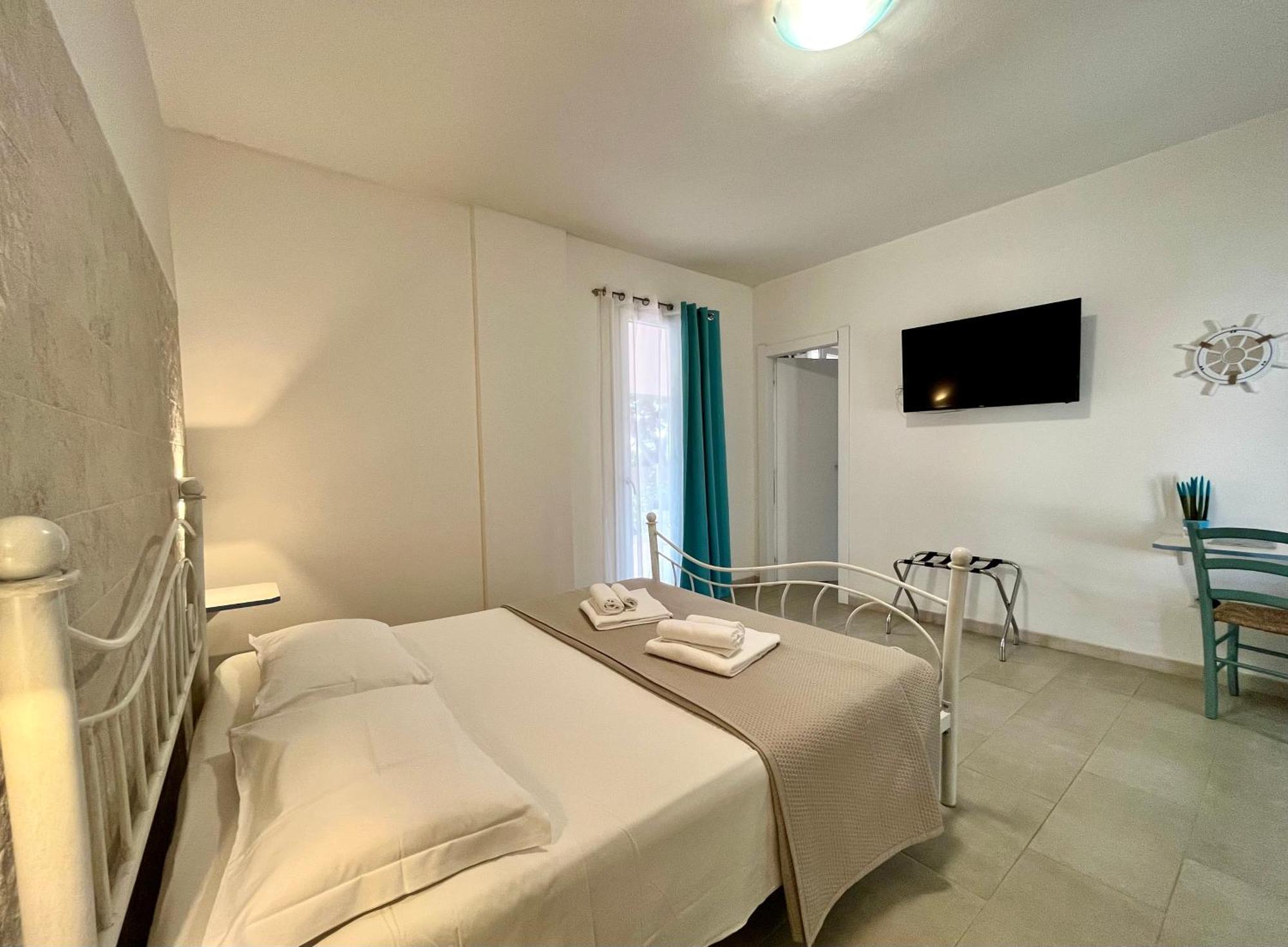 Angolo Mare Apartments & Rooms Порто-Пино Экстерьер фото